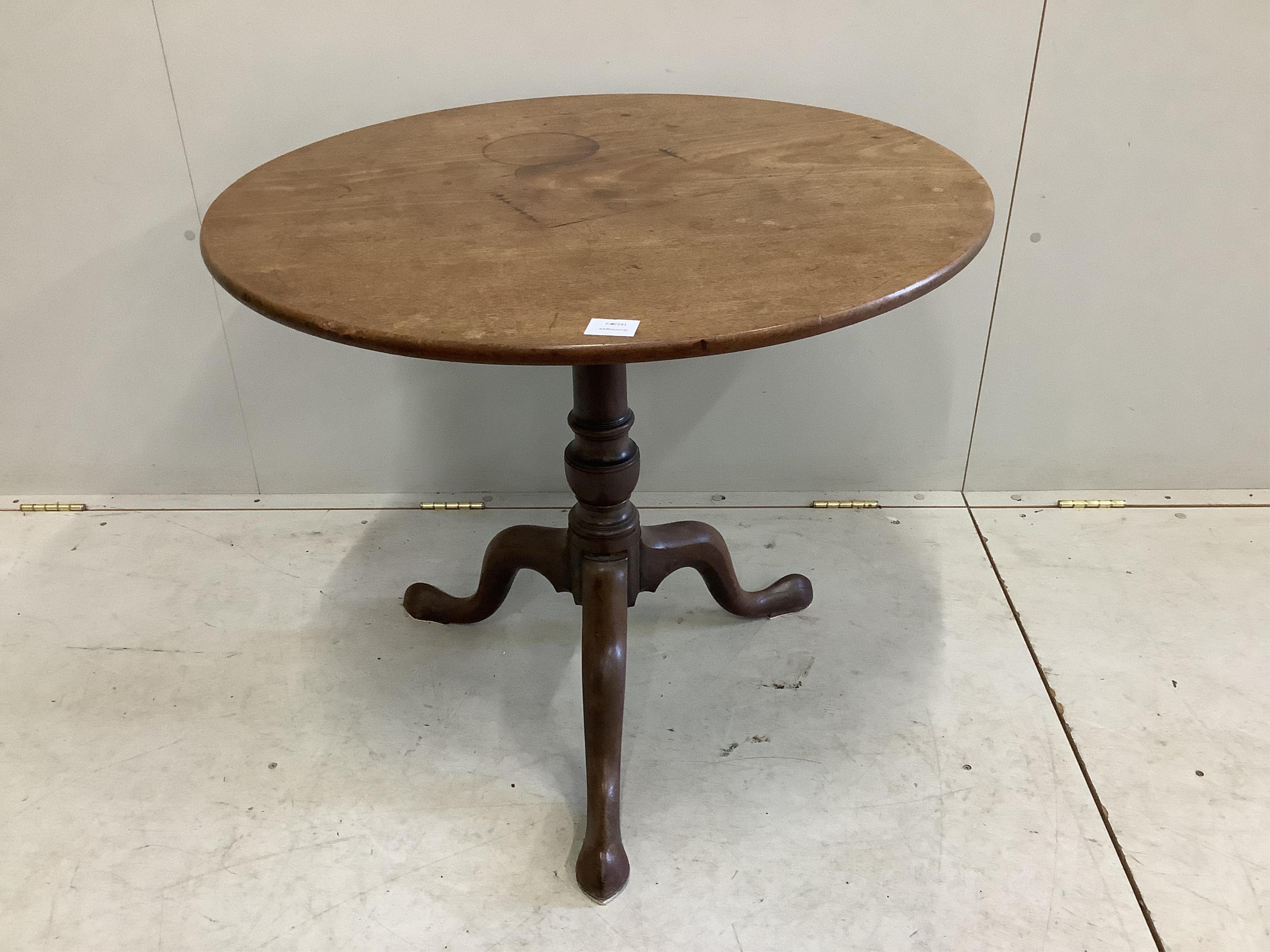 A George III mahogany circular tilt top tea table, diameter 80cm, height 68cm. Condition - poor to fair